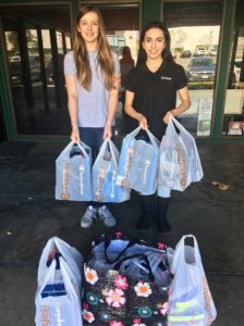 Kids help buy shoes for kids