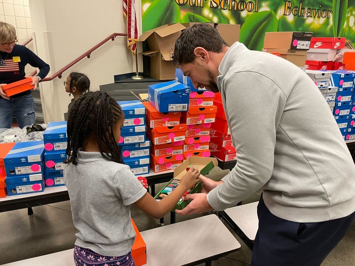 Clark County Commissioner Naft gives shoes