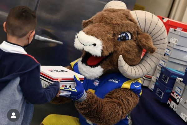 Rams mascot Rampage gives shoes