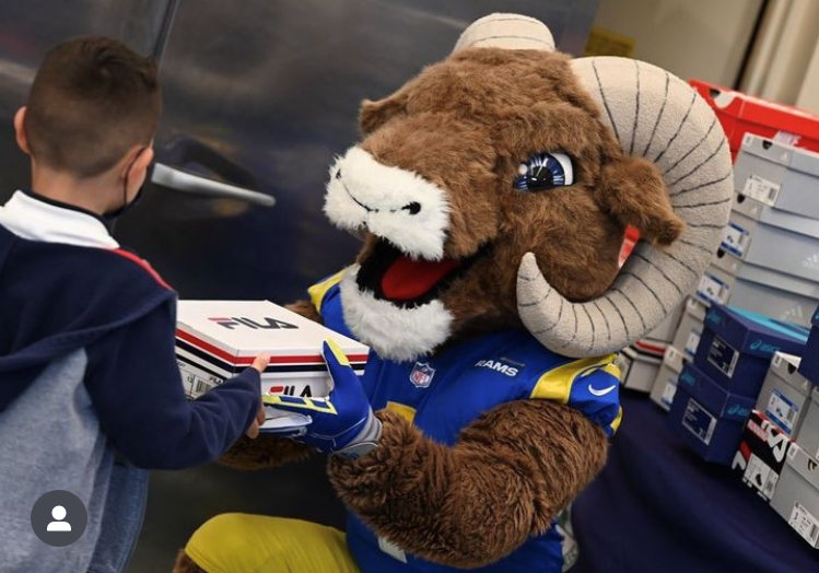 Rams mascot Rampage gives shoes