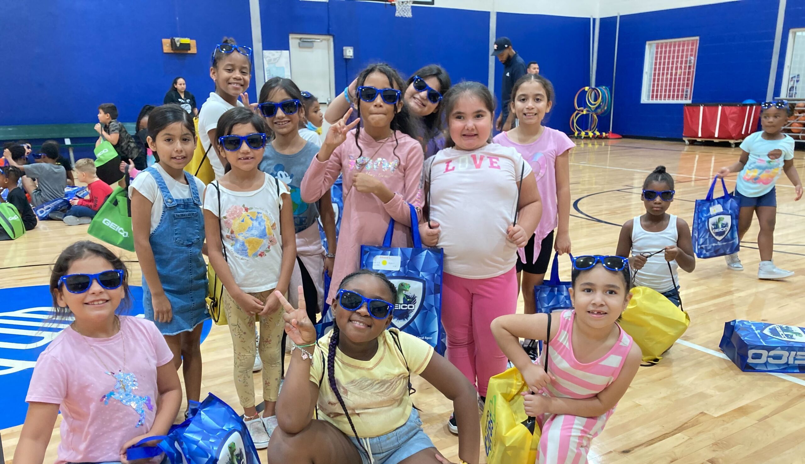 Children show off their new sneakers